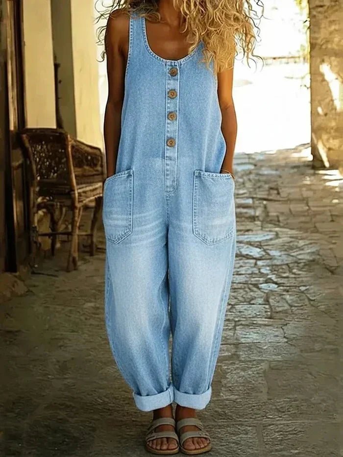 Women's denim scoop neck sleeveless jumpsuit, loose fit casual one-piece with button front, perfect for summer.