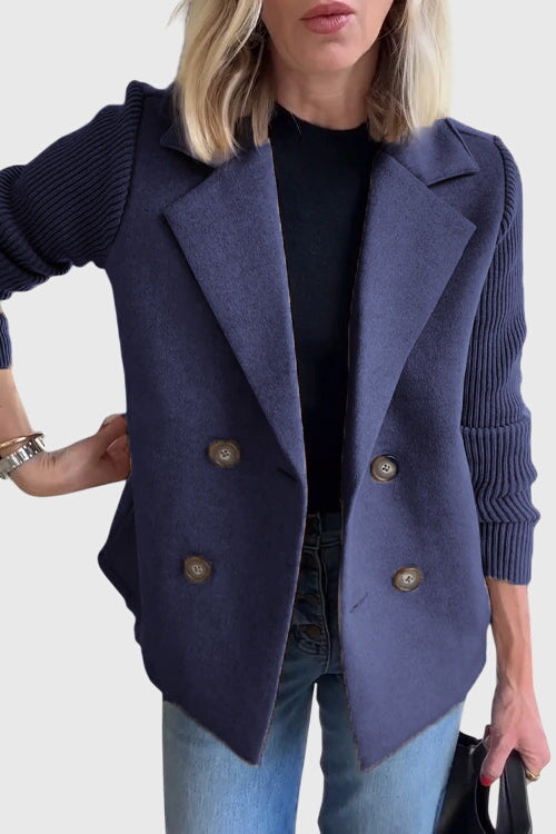 Versatile women's double-breasted blazer, ideal for office wear with stylish contrast sleeves.