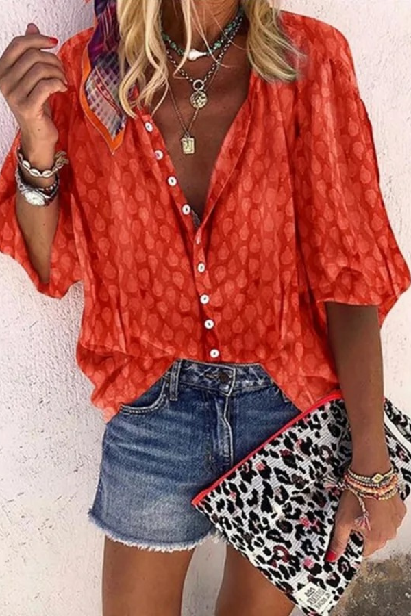 Vibrant women's airy button-front blouse. Chic, versatile long sleeve top, ideal for casual spring or elegant summer outfits.