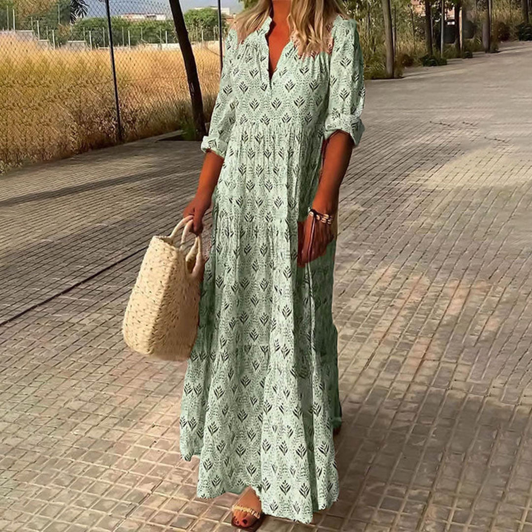 Side view of a relaxed fit women's boho print maxi dress, long sleeve, with an elegant V-neckline for summer style.