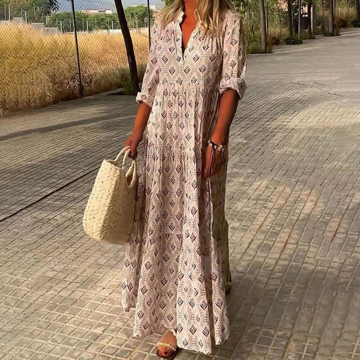 Versatile women's boho print V-neck maxi dress, suitable as a casual summer dress, long sleeve beachwear or festival outfit.