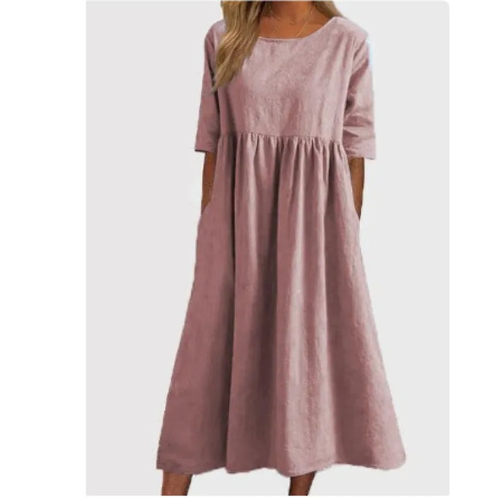 Women's maxi dress, casual & comfortable, with half-sleeves and pockets. Ankle-length, modest for everyday wear.