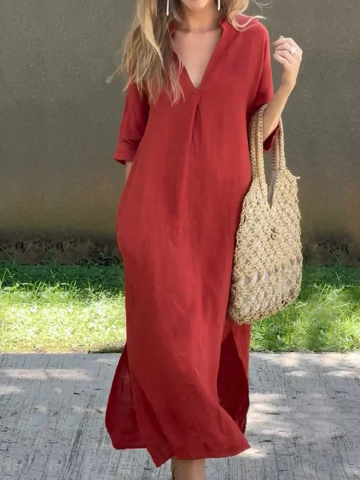 Elegant women's V-neck maxi dress with side slits. Ideal for resort wear, vacation, or stylish everyday fashion.