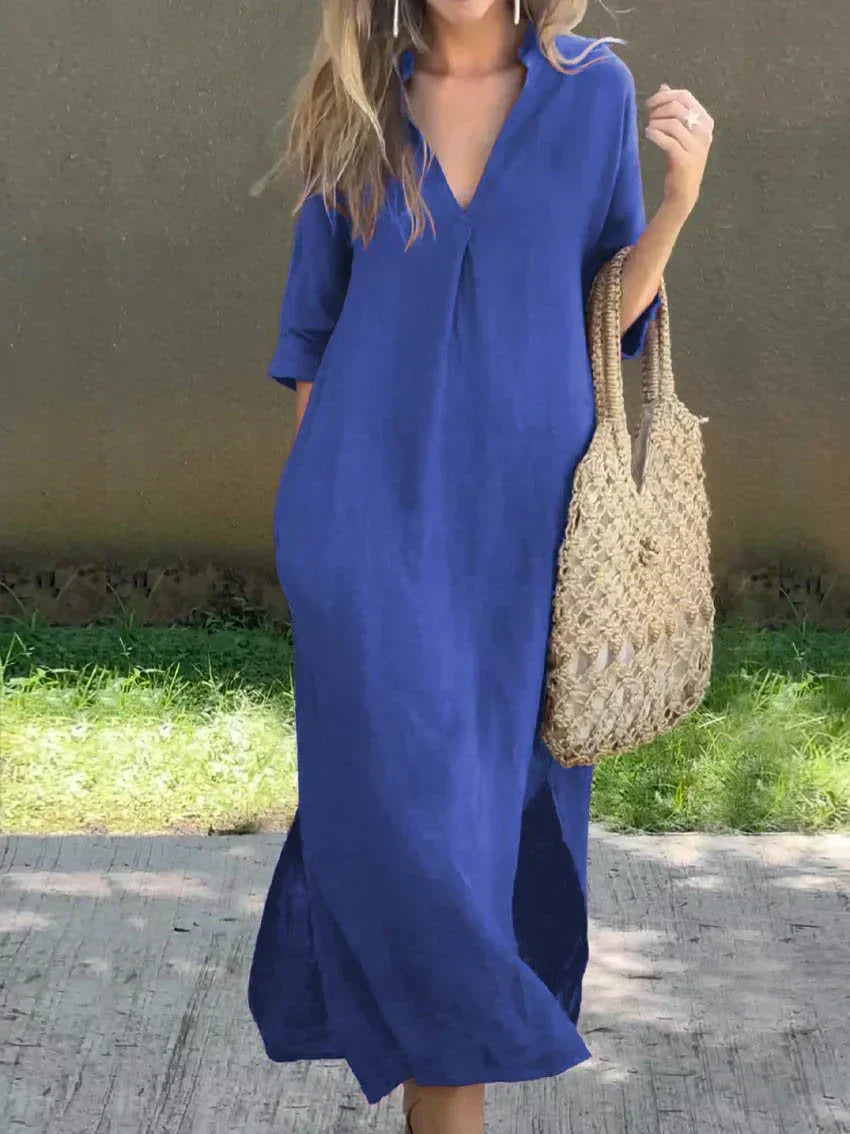 Effortless V-neck maxi dress for women, featuring a comfortable relaxed fit, 3/4 sleeves, and chic side slit.
