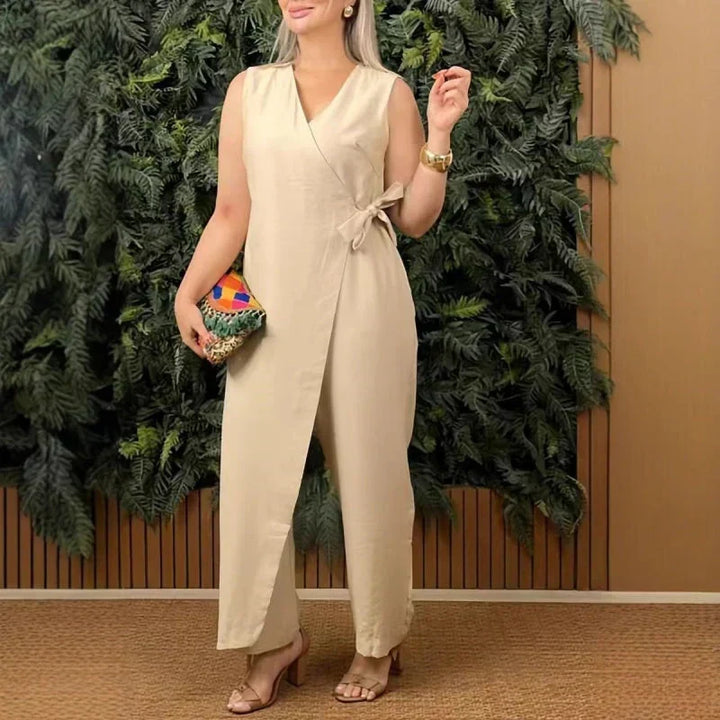 Elegant sleeveless wide leg jumpsuit for women, featuring a flattering wrap V-neck, perfect for casual chic.