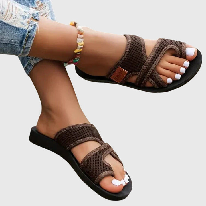 Orthopedic women's sandals with elastic fit & contoured arch support, providing superior comfort & foot pain relief.