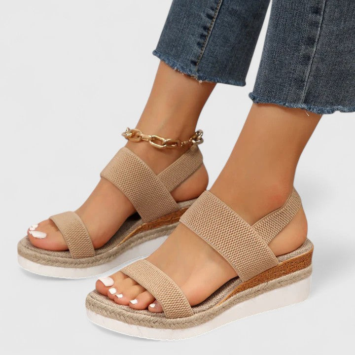 Chic women's open toe espadrille wedge sandals featuring soft elastic straps & a comfortable slip-on design.