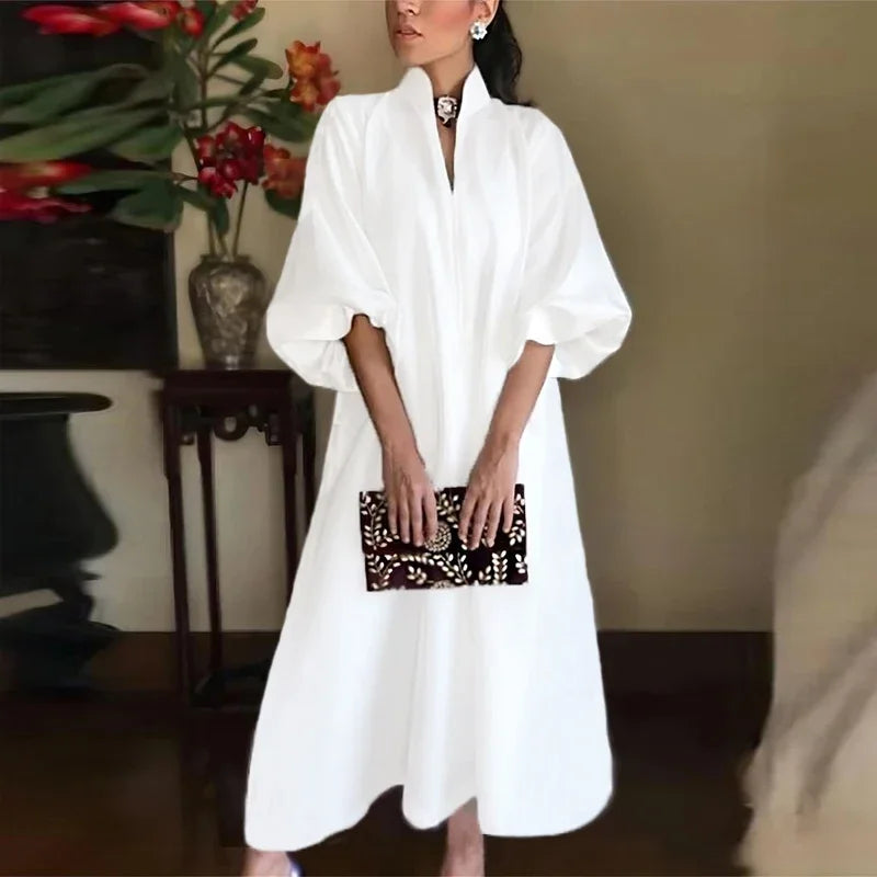 Women's elegant A-line midi formal evening dress featuring a stylish stand collar and chic puff sleeves.