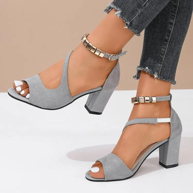 Dressy women's block heel sandals with an eye-catching beaded ankle strap for elegance.