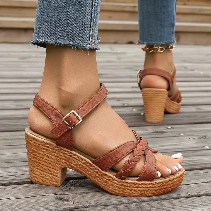 Stylish women's block heel sandals, versatile for dress or party wear, features a secure ankle strap.