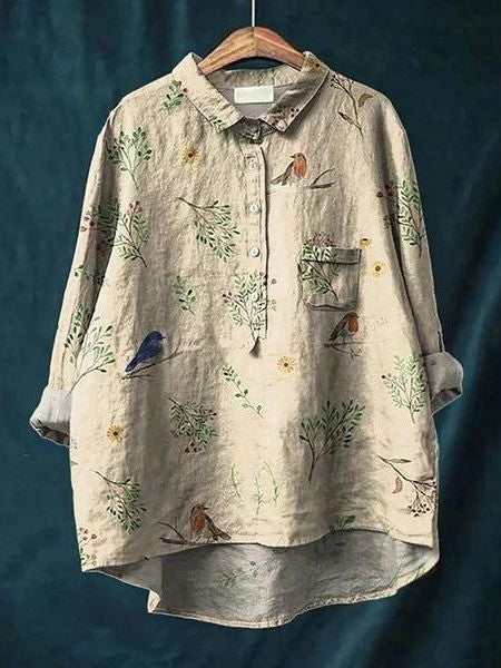 Trendy loose-fit women's floral blouse, a comfortable and elegant top for spring and summer.