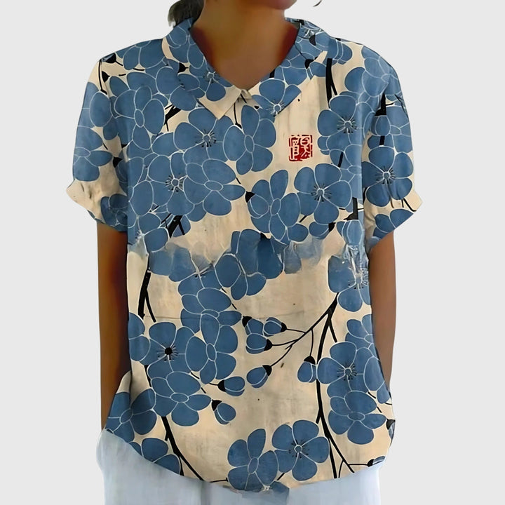 Long sleeve floral blouse, a versatile women's top for spring fashion and chic everyday wear.