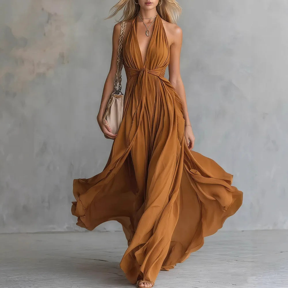 Beautiful women's pleated halter maxi dress with an alluring backless cut and graceful side slit.