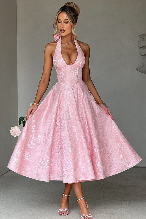 Back view: Women's halterneck A-line maxi dress, featuring a keyhole back & flowing skirt for formal wear.