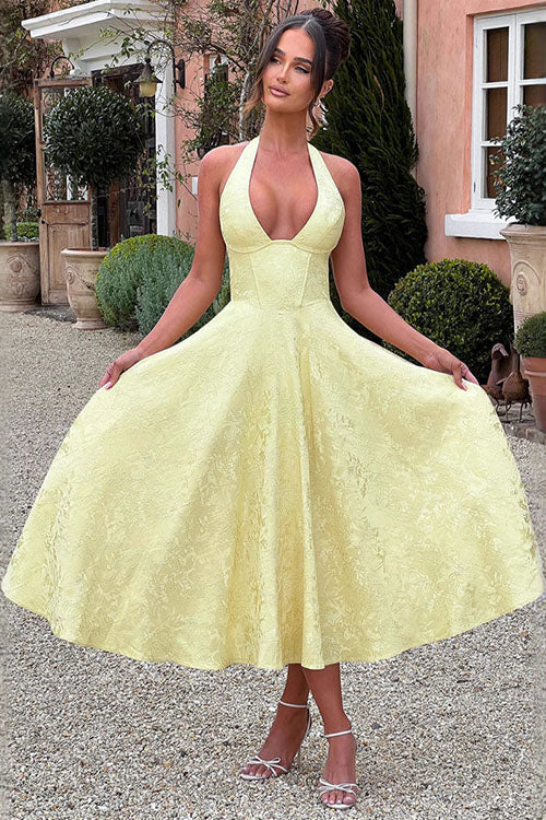 Elegant women's prom dress, A-line maxi with halterneck & open back detail. Perfect for evening events.