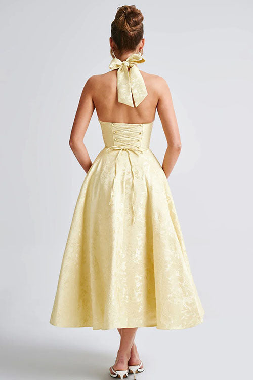 Women's special event A-line maxi dress, featuring a prominent halterneck & sleek silhouette.