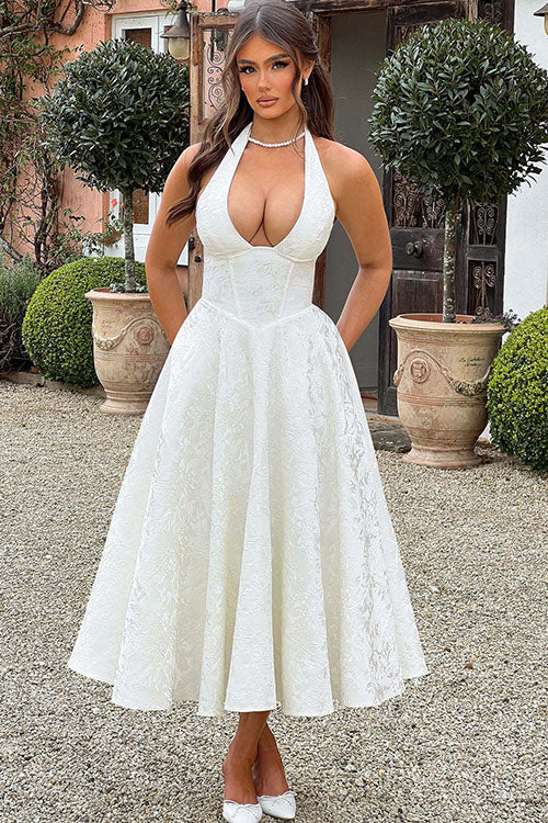 Women's sophisticated A-line homecoming dress, long, with a chic halterneck & comfortable fit.