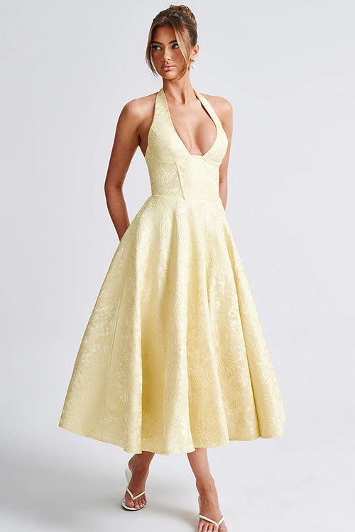 Women's long elegant dress, A-line silhouette, halterneck, perfect for a refined evening affair.