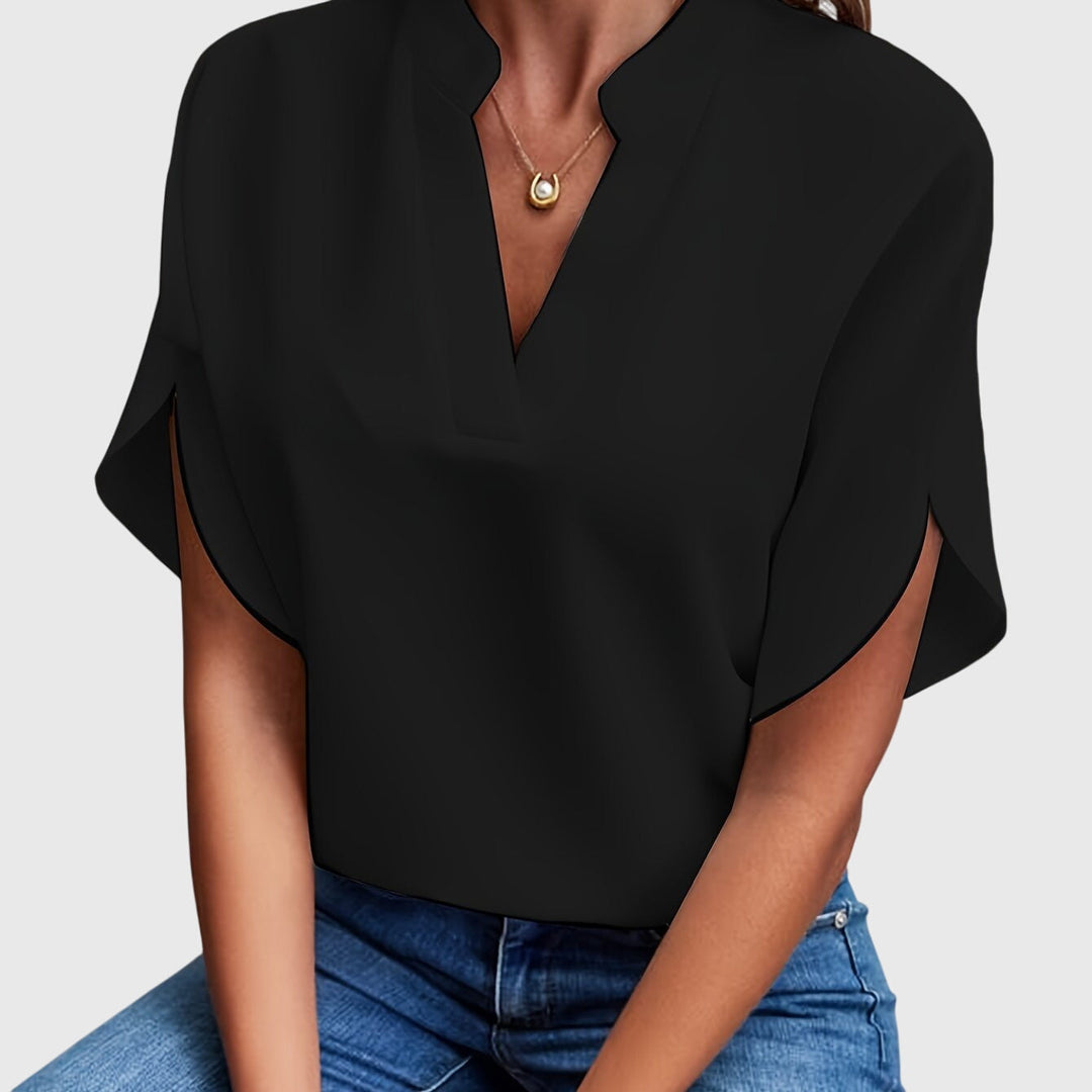 Sophisticated women's long-sleeve blouse, a timeless fashion statement for any event.
