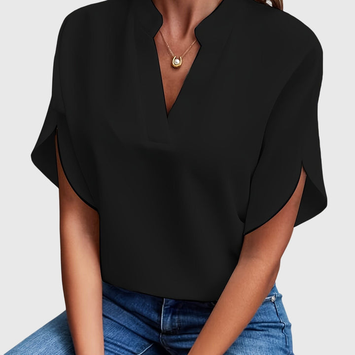 Sophisticated women's long-sleeve blouse, a timeless fashion statement for any event.