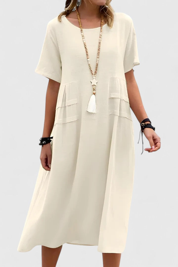 Women's elegant midi dress, perfect for versatile styling from day to evening. Flattering and chic.