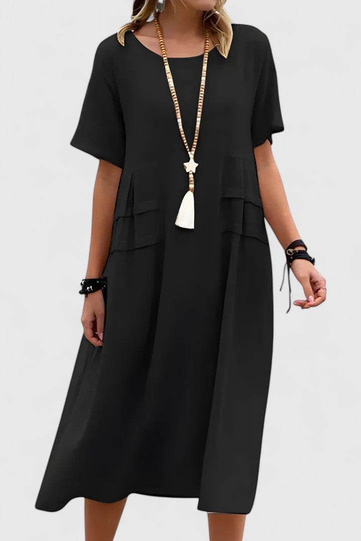 Chic women's midi dress, perfect as a party dress or sophisticated evening wear. Elegant and flattering silhouette.