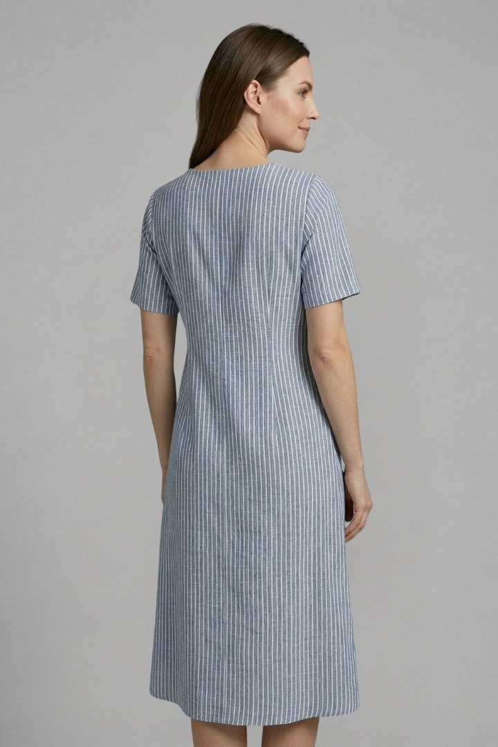 Lightweight women's midi dress, V-neck, and button-front design for comfortable, stylish spring/summer fashion.