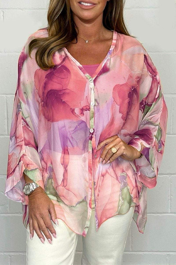 Fashionable women's elegant blouse with unique print. Comfortable & chic for spring & summer wear.