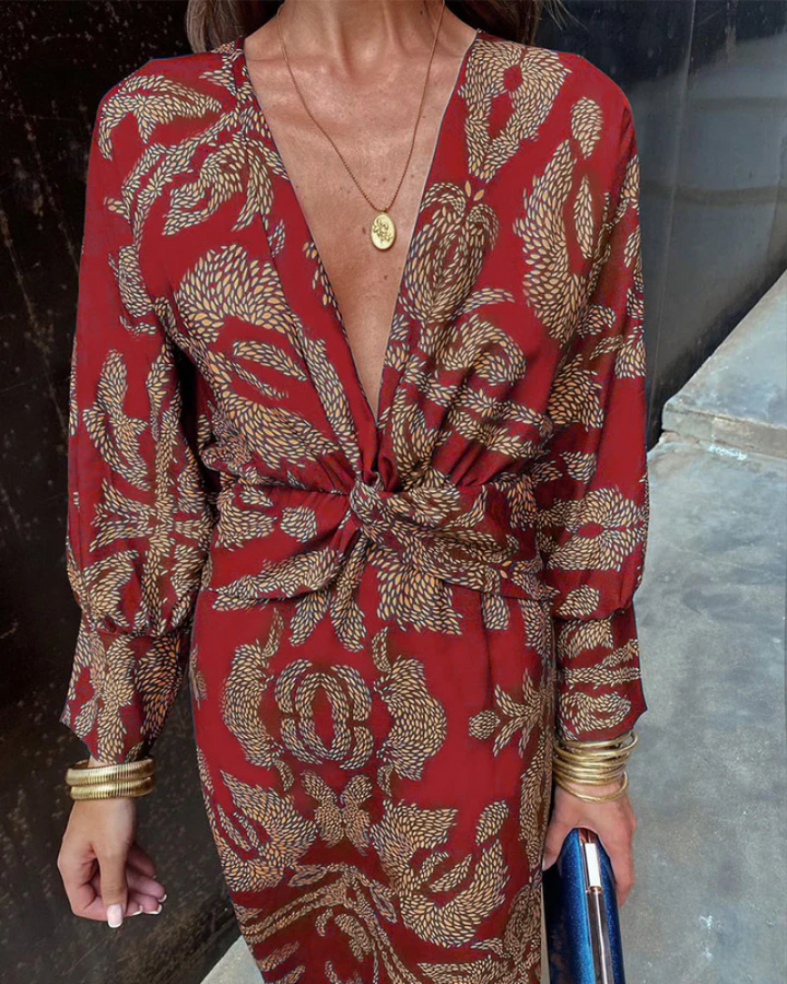 Stylish women's printed long sleeve v-neck maxi dress, ideal wedding guest attire or special occasion.