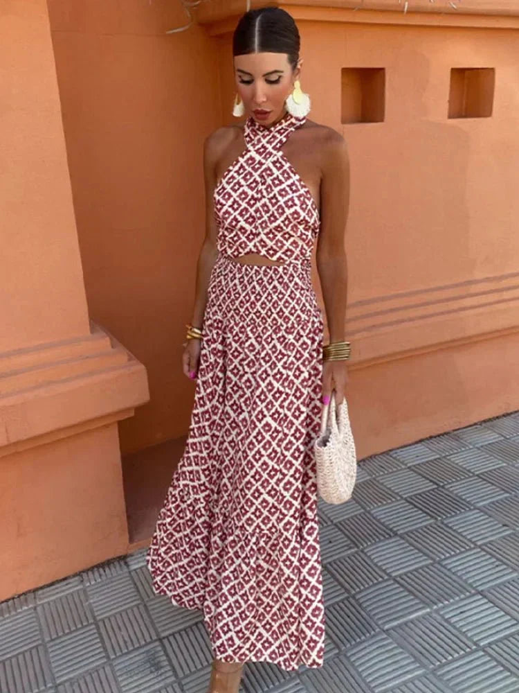 Women's elegant red printed halter maxi dress, perfect for wedding guests & special occasions. Formal evening wear.