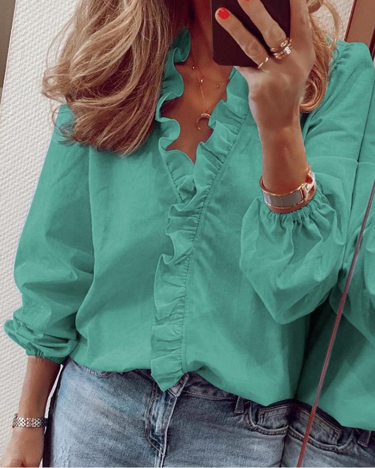 Versatile long sleeve ruffled V-neck blouse for women, an elegant & chic wardrobe staple.