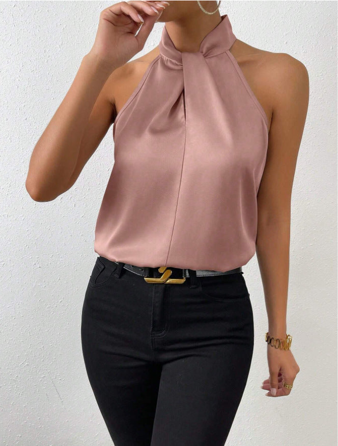 Elegant women's short sleeve top featuring a chic twist knot neck. Perfect versatile fashion.