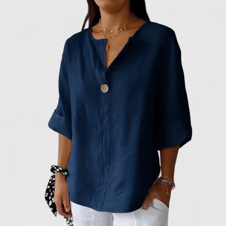 Chic women's V-neck blouse with knot detail. An elegant, loose-fit top perfect for summer and everyday.