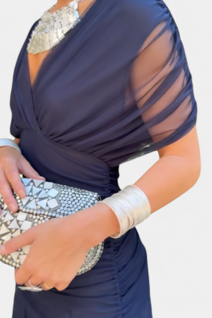 Chic purple V-neck maxi dress, ruched waist. Women's flowy long dress for elegant summer evenings.