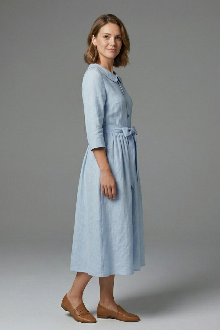 Flattering women's midi dress with V-neck and adjustable waist tie. Great for casual or formal wear.