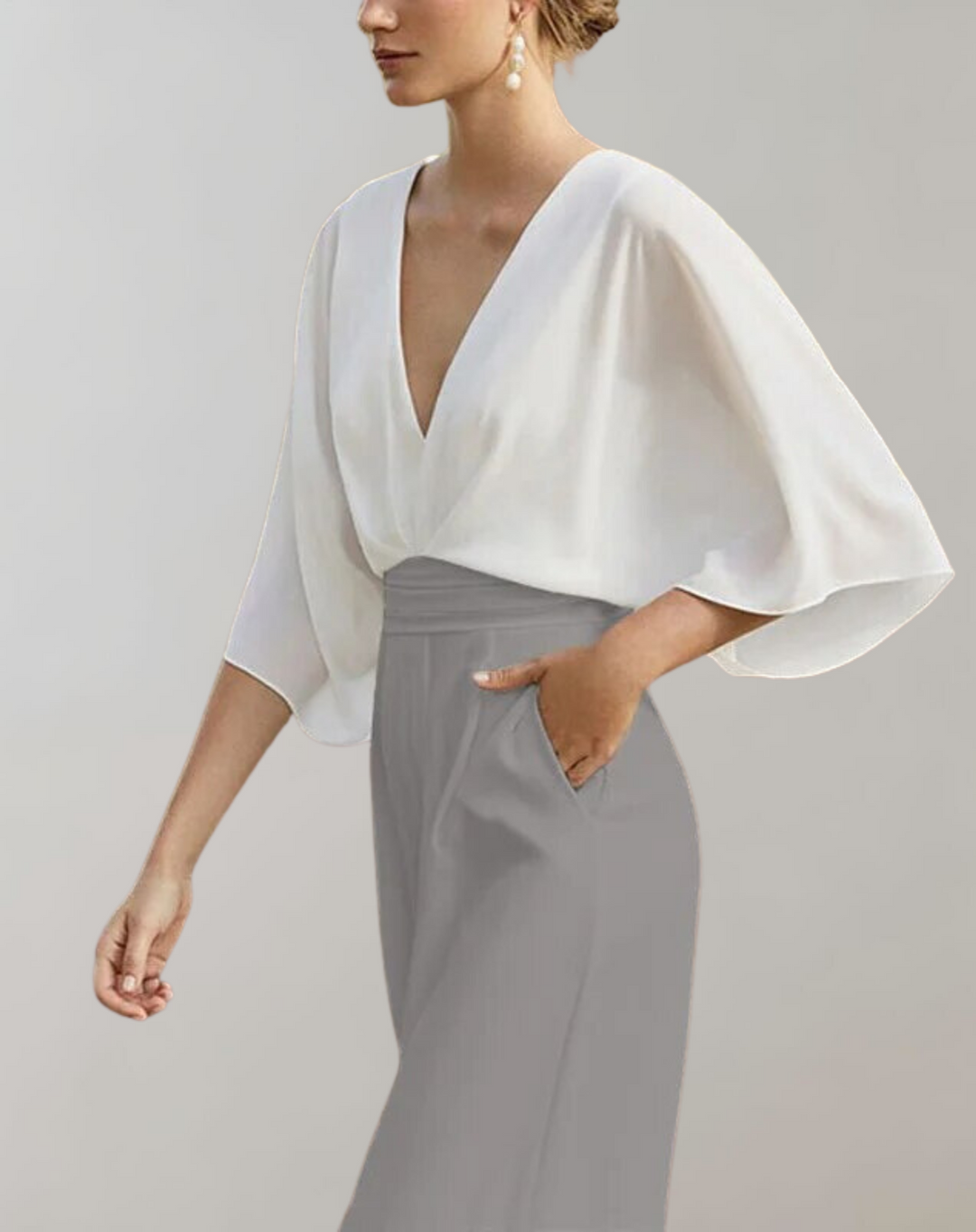 Elegant women's wide leg evening jumpsuit with chic button front. Perfect party outfit or formal wear.