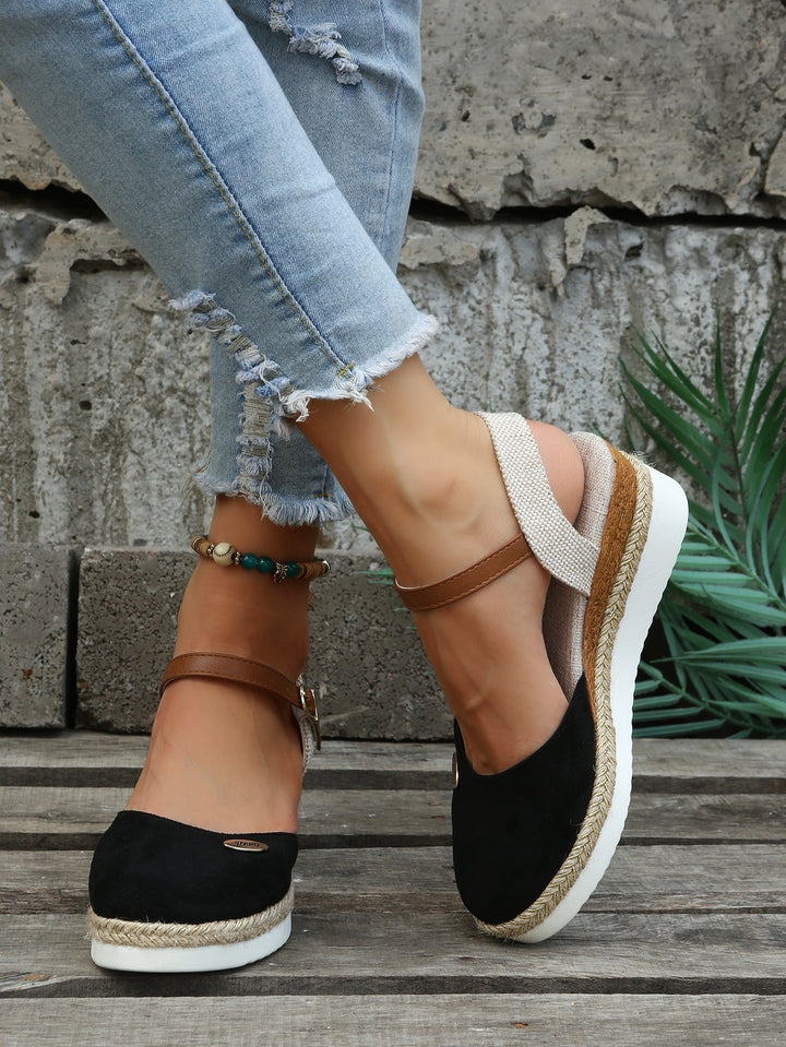 Women's comfortable slip-on woven sandals with cushioned footbed. Ideal casual summer footwear for beach or everyday.