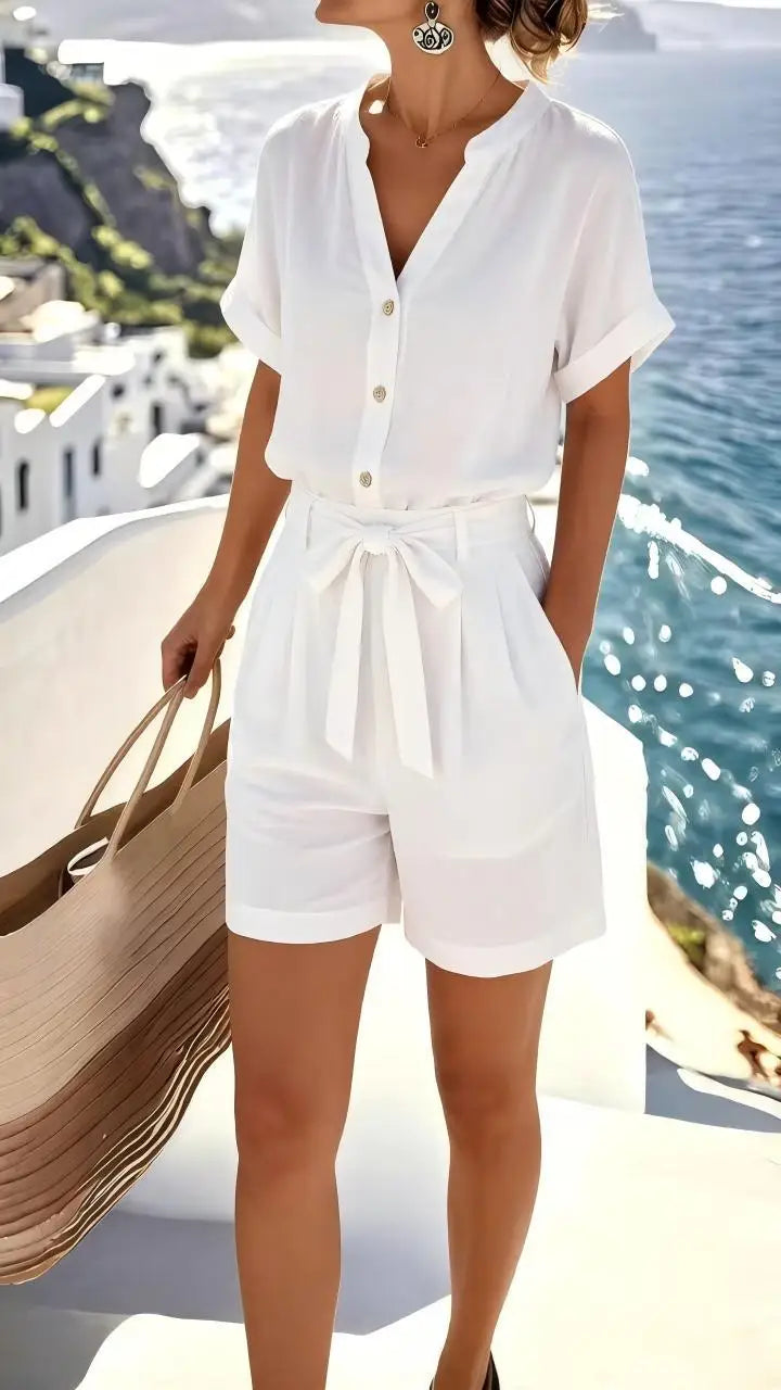 Chic women's sleeveless romper with a stylish tie-front detail, ideal for comfortable easy wear during summer.