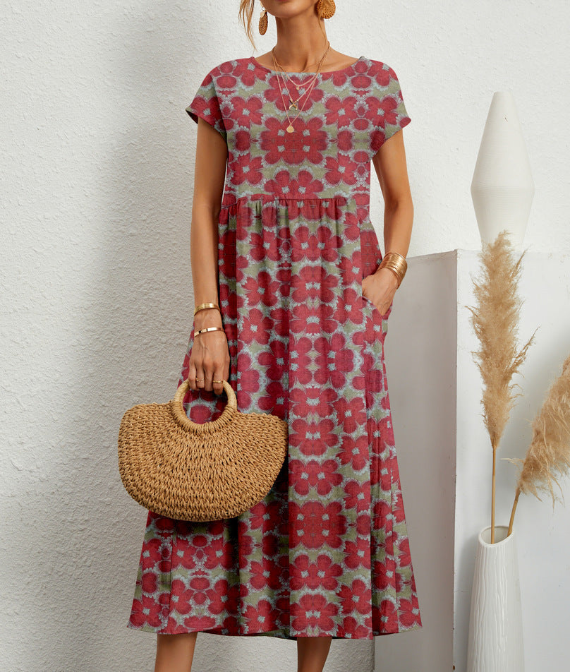 Casual women's summer midi dress, vibrant floral print, A-line cut, short sleeves & practical pockets. Easy wear.