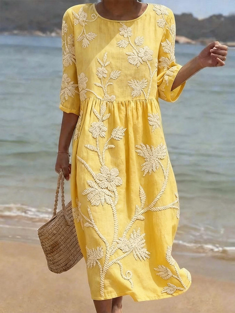 Casual yet elegant women's floral embroidered maxi dress, flowing design, perfect for spring/summer comfort.