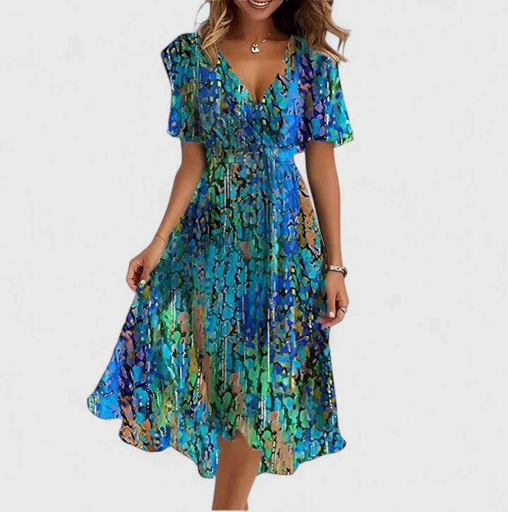 Women's floral flutter sleeve midi dress with V-neck and elegant high-low hem, perfect for spring and summer events.