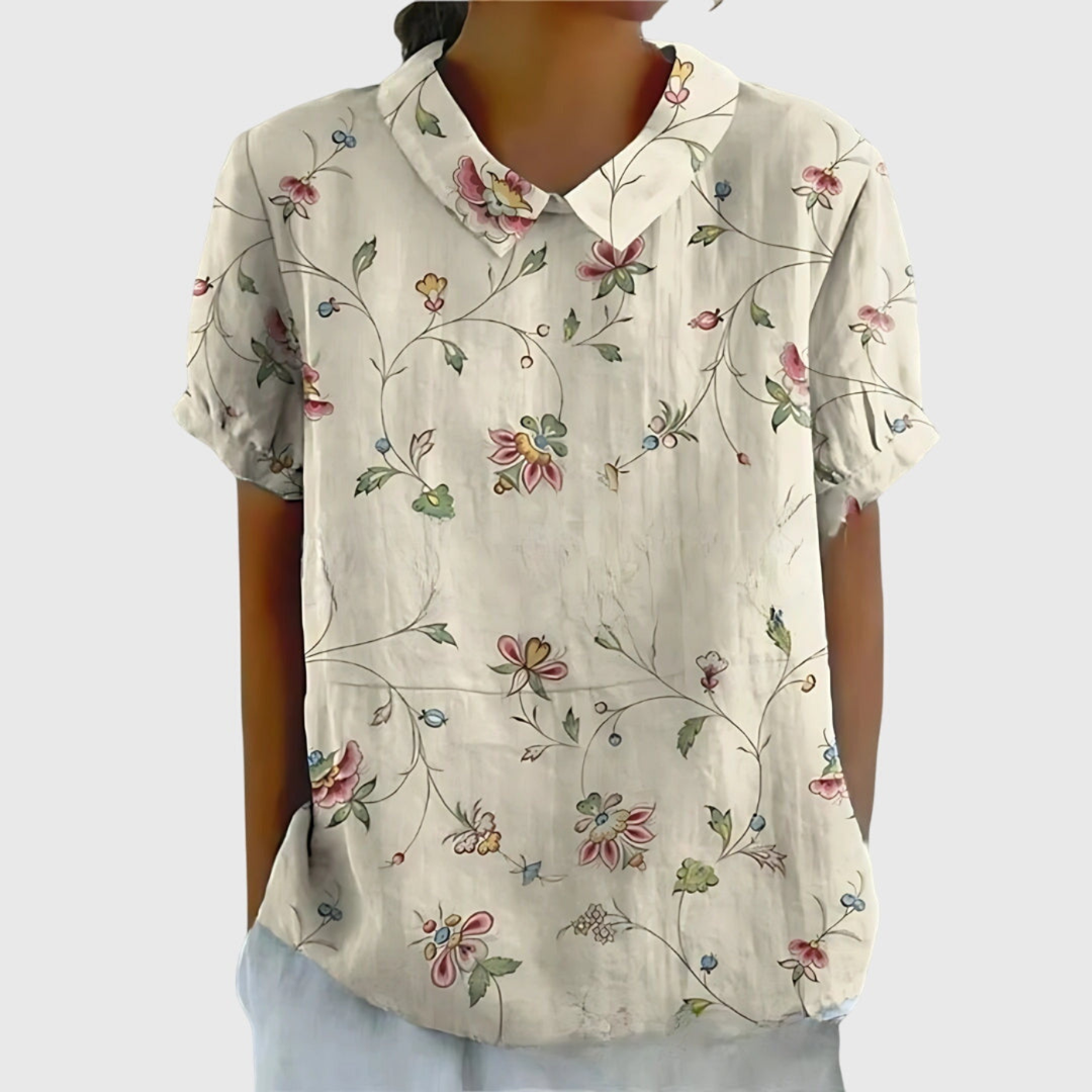 Versatile women's collared floral top, easy care, suitable for casual outings or semi-formal office wear.