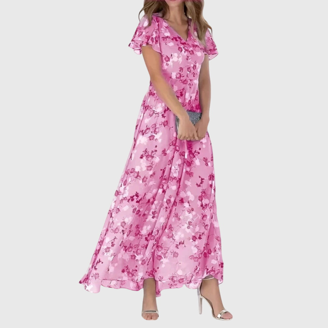 Stylish women's floral print summer maxi dress with flutter sleeves, great for casual outings or evening parties.