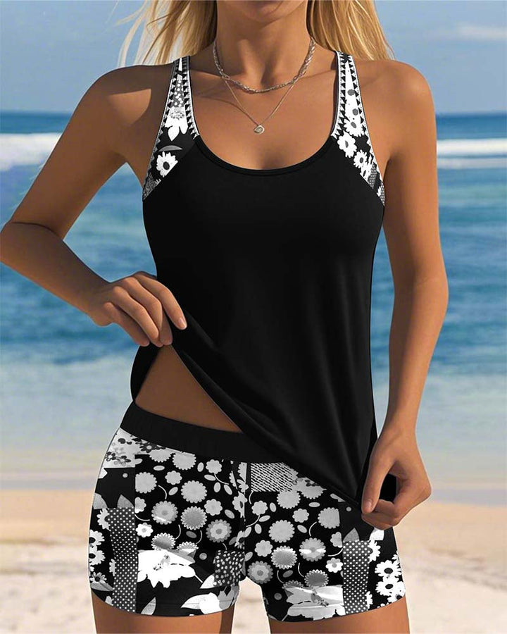 Two-piece women's floral tankini swimwear set; top & swim shorts for summer beach and vacation.