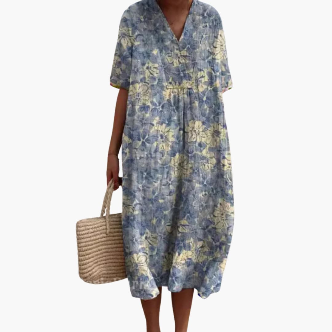 Casual women's floral print V-neck midi dress with a comfortable oversized fit and useful pockets.