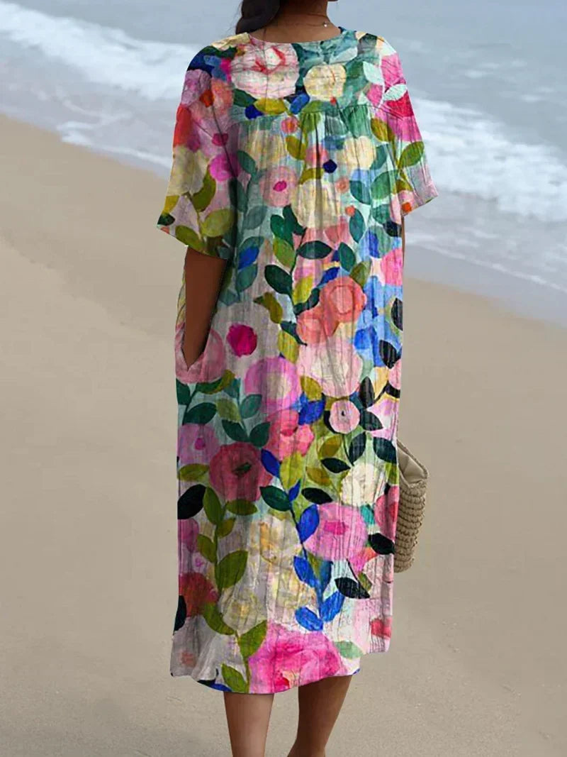 Comfortable women's oversized floral V-neck midi dress, ideal for spring vacation or relaxed beach style.
