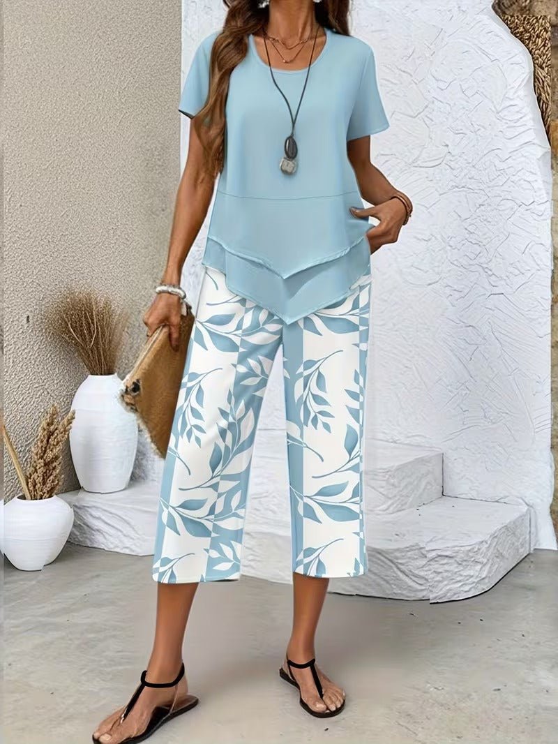 Comfortable women's two-piece floral wide leg pant set, ideal for loungewear & vacations.
