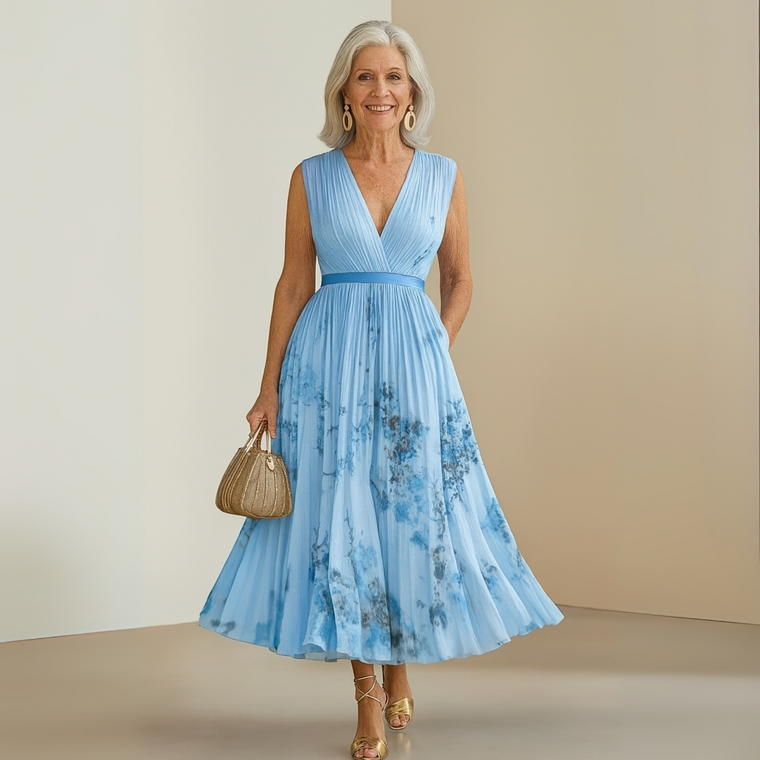 Vacation-ready sleeveless maxi dress, flowing fabric offers relaxed summer wear and elegant style.