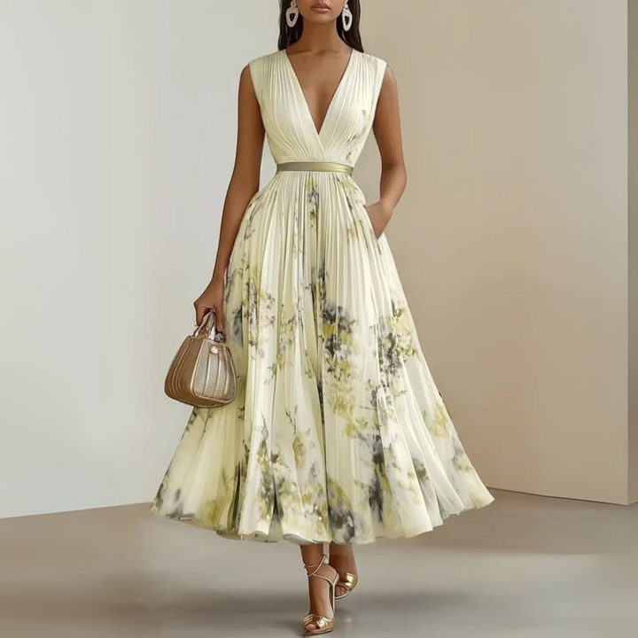 Stylish women's V-neck sleeveless flowing maxi dress, versatile for summer day or evening elegance.