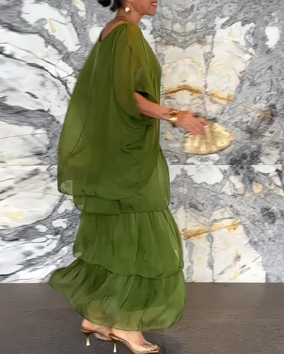 Women's elegant layered boho maxi dress & batwing top set, creating a beautiful flowy two-piece summer outfit.